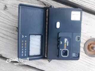  14 polarid sx70 & OLYMPUS & KODAK DISC