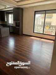  1 شقة فاخرة مع روف الجبيهة ضاحية الرشيد قرب دوار الجاذبية 180م مع روف غير مبني اطلالة رائعة جدا