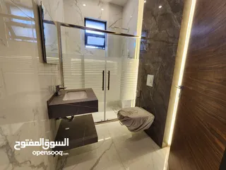  6 شقة طابقية فاخرة للبيع في عبدون ref : 14384