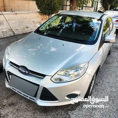  1 فورد فوكس عداد قليل استخدام شخصي يوجد بعض الضربات الخفيفة موديل 2013 هاتش باك
