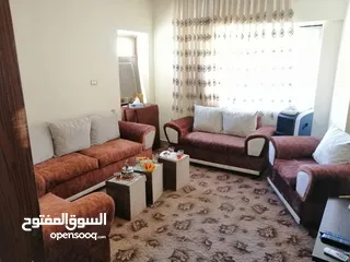  11 للبيع شقة طابق ارضي قرب دوار الدبابة مساحة 100+ترس وبلكونة