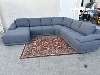  14 L shaped sofa come bed with storage.