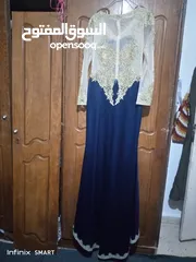  1 فستان سهرة كحلي ودهبي طويل