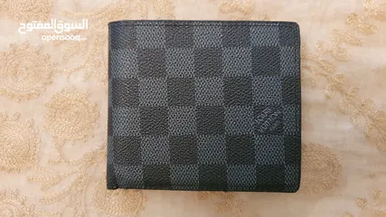  1 Louis Vuitton wallet