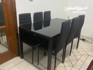  11 Black glass dining table with 6 chairs