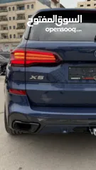  18 BMW X5 ترخيص 2022 ص   محرك 3000 هايبرد plug in/يقطع على الشحنه 80 كيلو متر  399 حصان