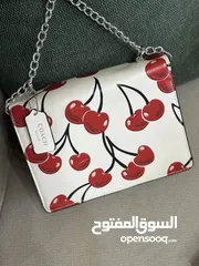  2 حقيبة COACH الأصلية – لمسة أنيقة بطابع مرح