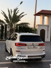  4 BMW X5 2020 M Sport plug in وارد الشركة اعلا صنف فحص كامل لون مميز بسعر مغرري السياره بحاله الوكاله