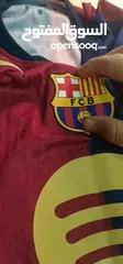  7 تيشيرت برشلونة نسخة لاعبين  كوبي ون مع شعار دوري الابطال موسم24/25