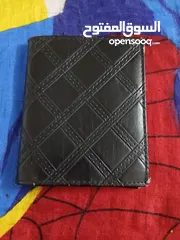  1 محافظ جيده جدا والاثنين في 4 دنانير فقط