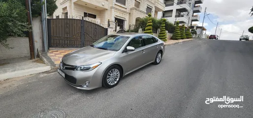  12 تويوتا افالون هايبرد 2015 فل كامل وأعلى صنف Limited وارد و مواصفات أمريكيه مالك واحد فحص كامل