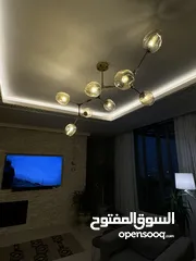  2 ثريا مودرن ذهبية بثمان رؤوس زجاج – من محل MECASA Khalda