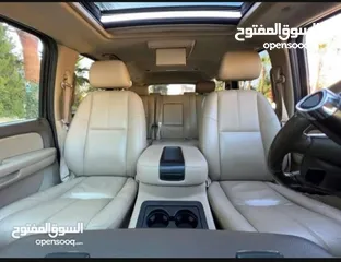  4 شيفرولية تاهو 2009 اسود هايبرد