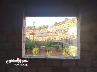  13 بيت عظم المغاريب واجهة حجر