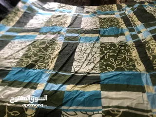  1 لحاف صوف   اصلي لسرير  مزوج  جديد  للبيع بداعي الحاجه