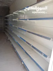  1 رفوف محل للبيع
