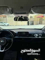  12 كيا بيكانتو 2021 بحالة زيرو لون ابيض لؤلؤي بجنن فل كامل أعلى صنف