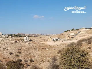  6 ارض للبيع 1500م في ارجمل مناطق المملكه في ابو السوس حوض الدبه حيث الاطلالات العاليه