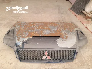  2 غطاء سيارة معدل أمامي ميتسوبيشي لانسر 2003 محتاج دهان فقط