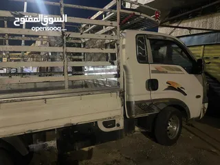  5 كيا بنجو كبينة وربع موديل 2010 لون ابيض
