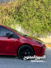  4 تويوتا بريوس برسونا 2021 لون احمر مميز جمرك جديد