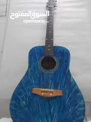  1 acoustic guitar