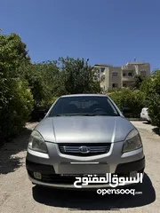  2 كيا برايد 2007 متور 1600 بنزين حساسات خلفيه تحكم ستيرنج تدفئة كراسي فحص نظيف