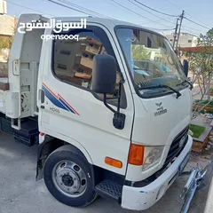  3 Hyundai Mighty dump truck