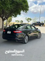  3 فورد فيوجن 2014 هايبرد تيتانيوم فل اضافات ماشيه 70 الف فقط بحاله الشركة
