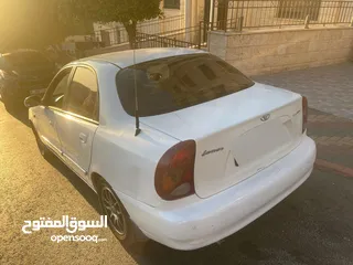  2 دايو لانوس موديل 2002 جير عادي سيارة مشالله ولا ضربة افحص وين بدك ترخيص تامين دفع فقط كاش
