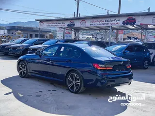  6 BMW 330E M PACKAGE