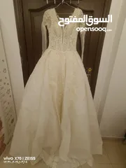  1 فستان زواج رائع وفخم مع طرحة شبه جديد