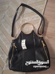  1 hand bag +Cross bag brand new