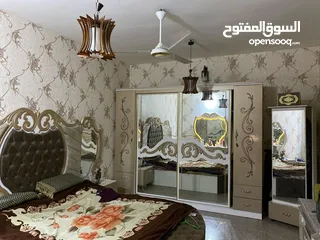  7 بيت للبيع بغداد حي الحسين التفاصيل بالوصف