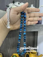  9 عرض خاص سبحه عين النمر ازرق او ذهبي بسعر حرق 33 حبة حلوة مش صغيرة للعلم مع طقم انتيومون مرتب