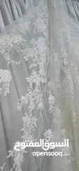  4 فستان عروس استخدام مرا وحدا