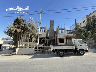  2 شقة في مرج  الحمام قرب دوار المرديني طابق أخير مع روف دوبليكس 135م وترس 80م