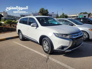  9 ميتسوبيشي أوتلاندر موديل 2018 (قابل للبدل) لون ابيض، دفع رباعي، فحص كامل ومرخصة حديثا لغاية 4/4/2026