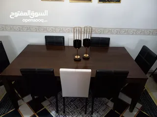  7 طاوله سفره مع 8 كراسي جلد