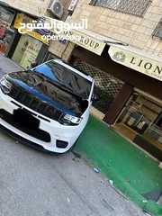  1 جيب شيروكي ملك العضلات الامريكي SRT8  موديل 2014 لون ابيض للايجار فقط من عند مكتب Lion  Group