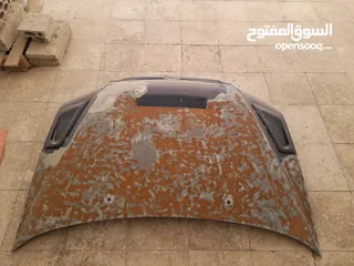 3 غطاء سيارة معدل أمامي ميتسوبيشي لانسر 2003 محتاج دهان فقط