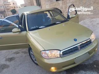  8 كيا سبكتر توماتيك اقساط دفعة 1200 دهان جديد  ماتور جديد  قير جيد  فحص مرفق  مكانيك سيارة مشية ناعمة