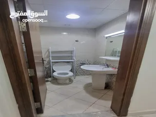  14 للايجار الشهري شقة غرفتين و صالة مفروشة في أبراج الواحة في عجمان بمنطقة الراشدية