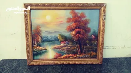  13 لوحات  رسم زيتي.. وتطريز