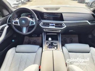  14 BMW X5 45e ترخيص 2022 ترخيص  محرك 3000 هايبرد plug in/يقطع على الشحنه 100 كيلو متر  399 حصان