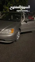  11 هوندا سيفيك هايبرد 2003