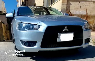  5 ميتسوبيشي لانسر 2014 بحال الوكالة