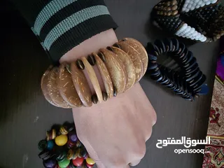  9 اساور خشبية ملونة جديدة