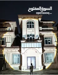 15 الكشاف الليزري مدى 1000 متر مع زوم و شاحن خلوي كشاف شحن ضد الماء  اضائه عاليه يمكن استخدامه كشاف راس