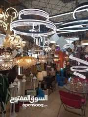  2 محل انارة مجهز بالكامل للبيع مع البضاعة بشارع الحرية بموقع مميز